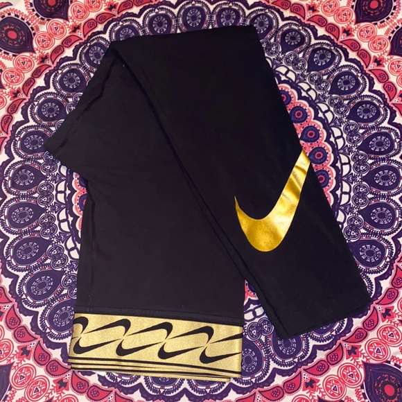 Nike gold swoosh leggings Clearance